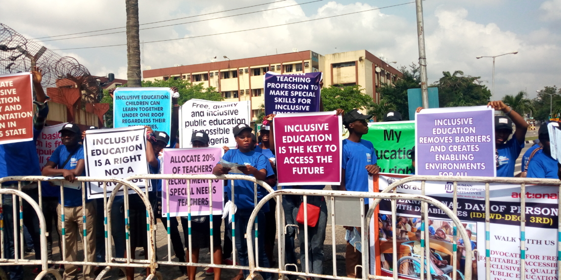 Group of persons during a walk to the Lagos State Governors office to advocate for inclusive education in commemoration of 2019 International Day of persons with disabilities