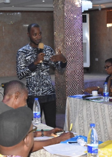 File - Samuel Ajayi, Programmes Officer, HDI while facilitating a session at the Stakeholders Meeting and Reflection Session on Breaking Barrier - Tax Justice and Gender Responsive Social Services.
