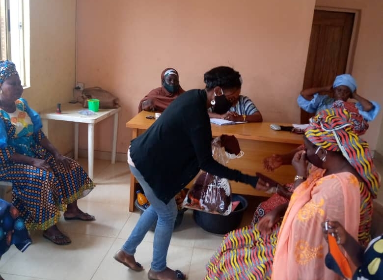 COVID-19 – Gender Advocate Distributes Face Masks To Market Women