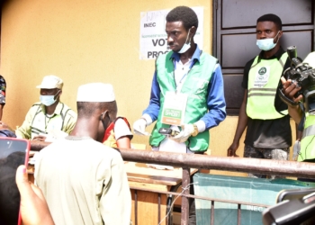 Four men standing outdoor