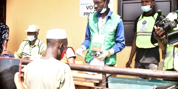 Four men standing outdoor