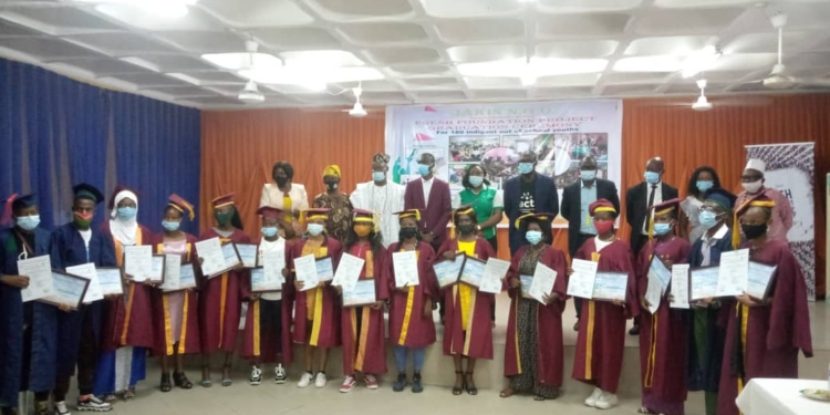 People Standing with certificates in their hand