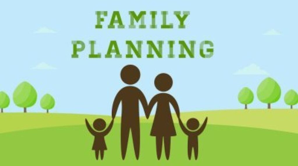 A silhouette image of man, woman and 2 children