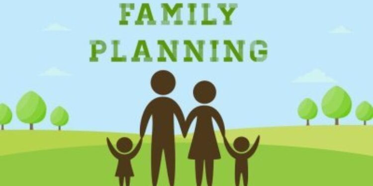 A silhouette image of man, woman and 2 children