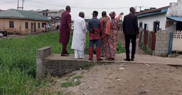 Residents of the community inspecting the flood prone areas