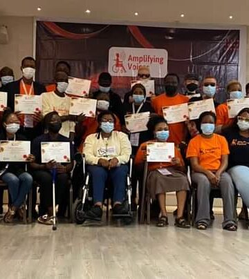 Group pictures of PWDs who have been trained by IFA