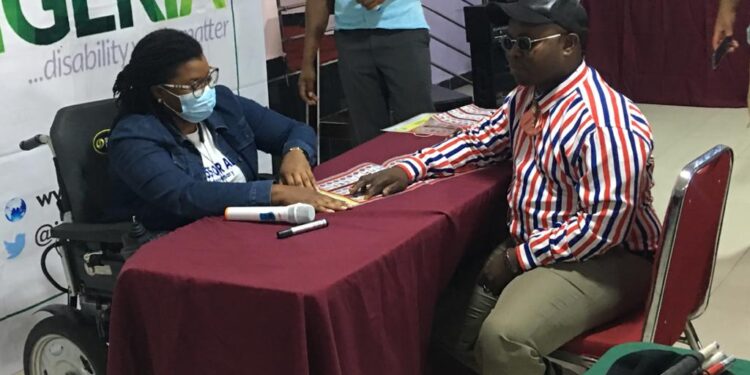 An Image of a blind person been train on how to use braile Ahead of Anambra Gubernatorial Election