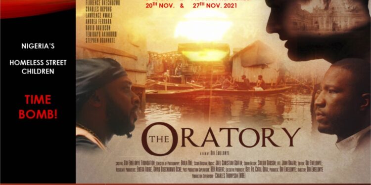 The Oratory movie flier. On it is an image of the face of one man on the left facing the image of another man on the right. Directly above the man on the right is the face of another man. Three faces in total on the image. Also written in it is the Oratory