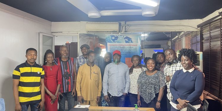 People standing together in a group photograph