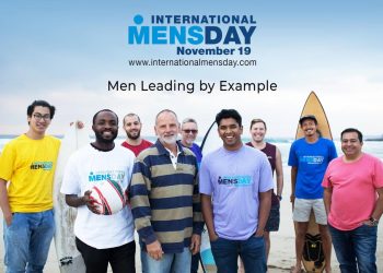Image of nine men standing outdoor