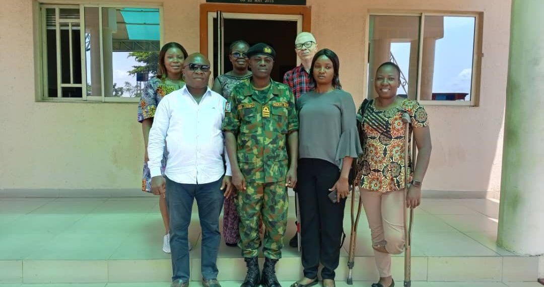 People with disabilities in a group picture