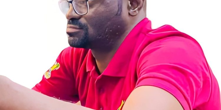 A man with glasses in a sitting position