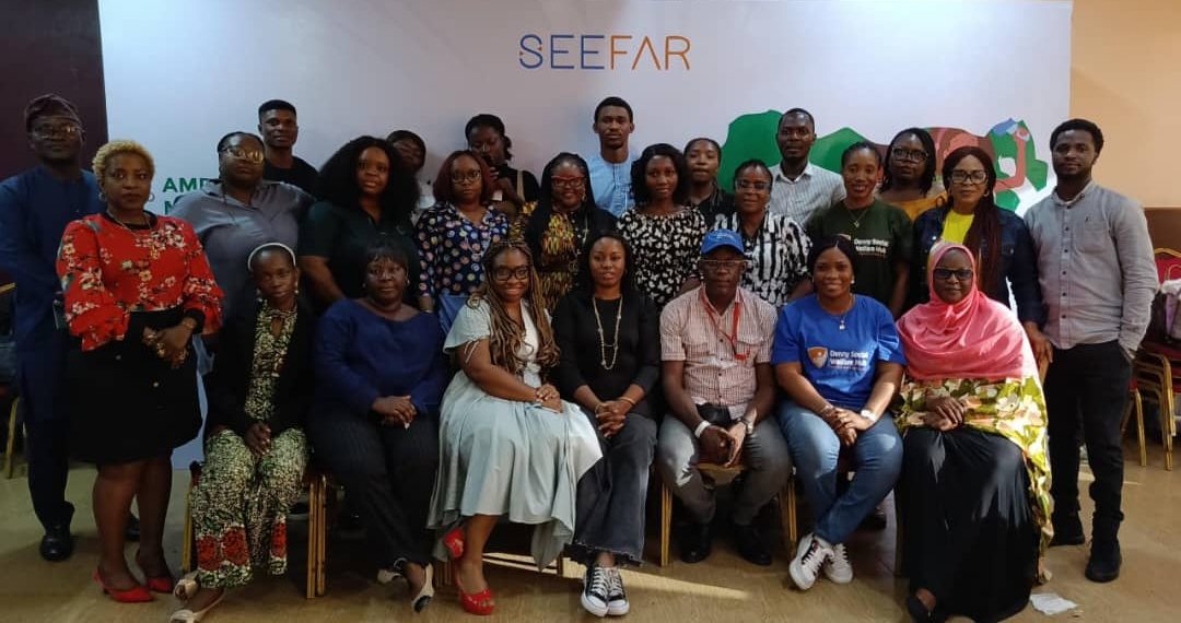 Women seated in group