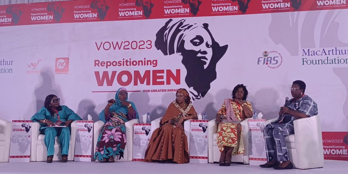 Women seated in a panel