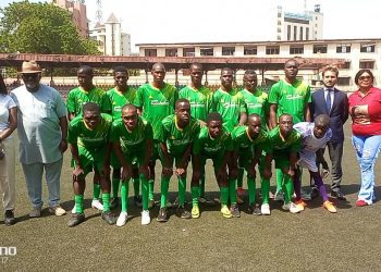 People standing on a football pitch