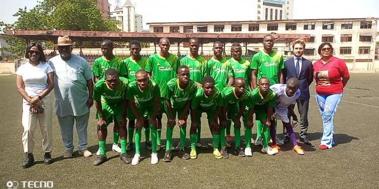 People standing on a football pitch
