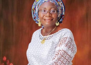 Mama in a picture, sitting down, the top part of the body showing.