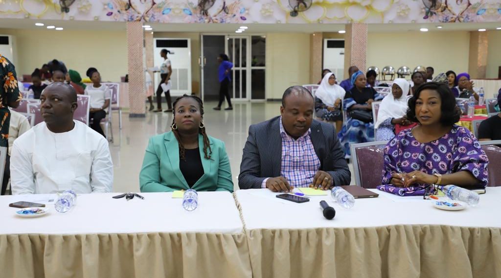 Four people already seated.