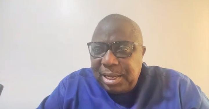 A man sitting indoor