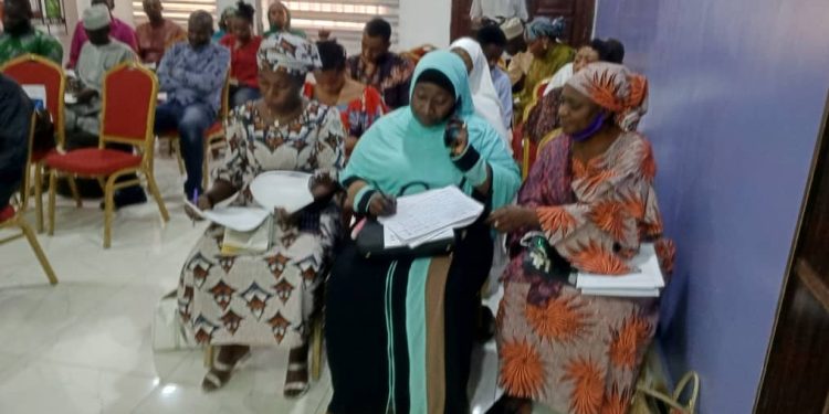 people sitting on chairs indoor