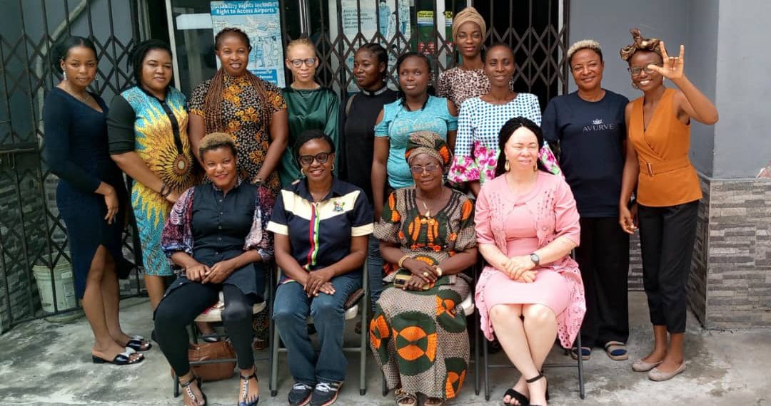 Women, some are seated while some are standing