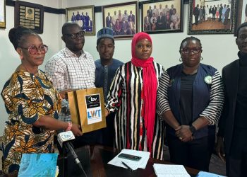 six persons standing indoor