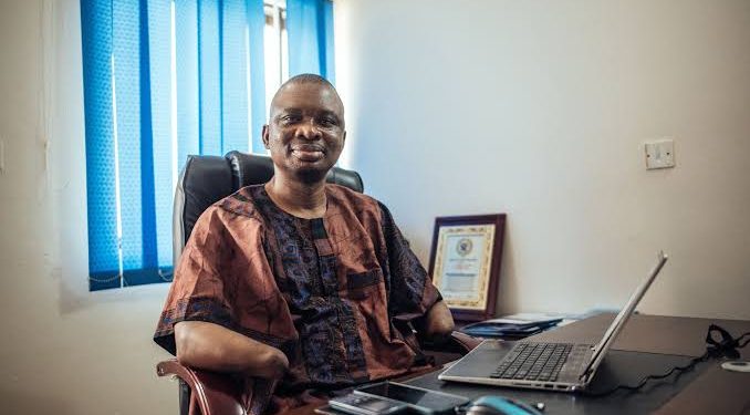 A man sitting indoor