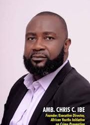 Shoulder to head shot of a bearded man in suit