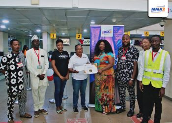 eight people standing indoor