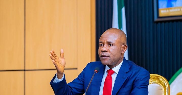 A man sitting indoor