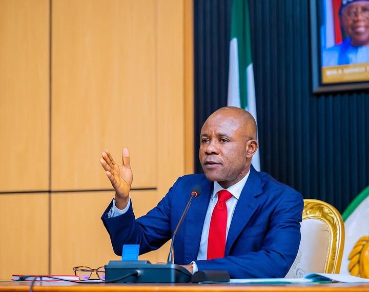 A man sitting indoor