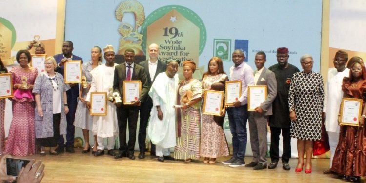 Group of people standing indoor