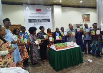 Group of people standing indoor