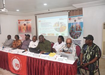 Eitght people sitting indoor