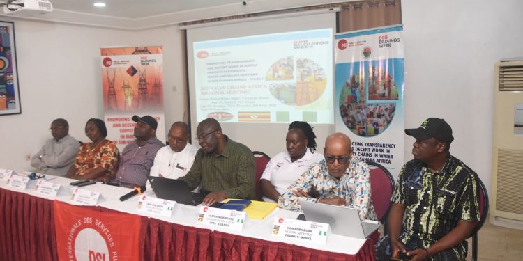 Eitght people sitting indoor