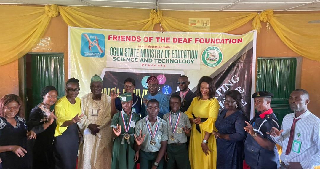 Group of people standing indoor