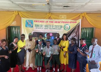Group of people standing indoor