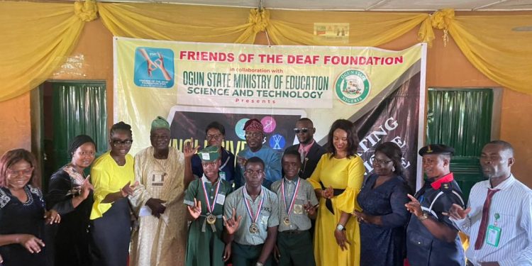 Group of people standing indoor