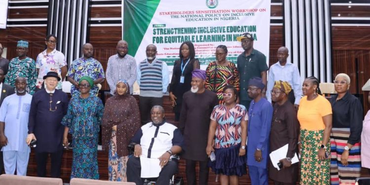 A group of people standing indoor