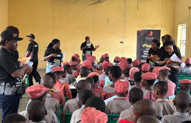 Many people sitting indoors