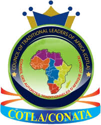 Logo of the Council of Traditional Leaders of Africa (COTLA). The circular emblem features a colorful map of Africa in the center, set against a green globe background. The map is divided into regions colored in orange, purple, blue, and pink. Surrounding the globe is a blue border containing the organization's name in both English and French: "COUNCIL OF TRADITIONAL LEADERS OF AFRICA (COTLA)" and "CONSEIL DES AUTORITÉS TRADITIONNELLES D'AFRIQUE (CONATA)." A blue and gold crown sits atop the circle, and a flowing blue ribbon at the bottom displays the acronym "COTLA/CONATA" in large yellow letters.