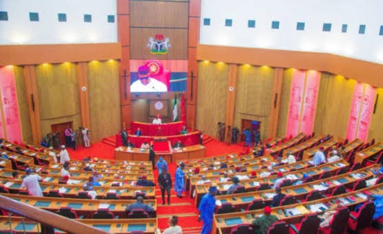 Image of the senate chamber indoors with senators seated