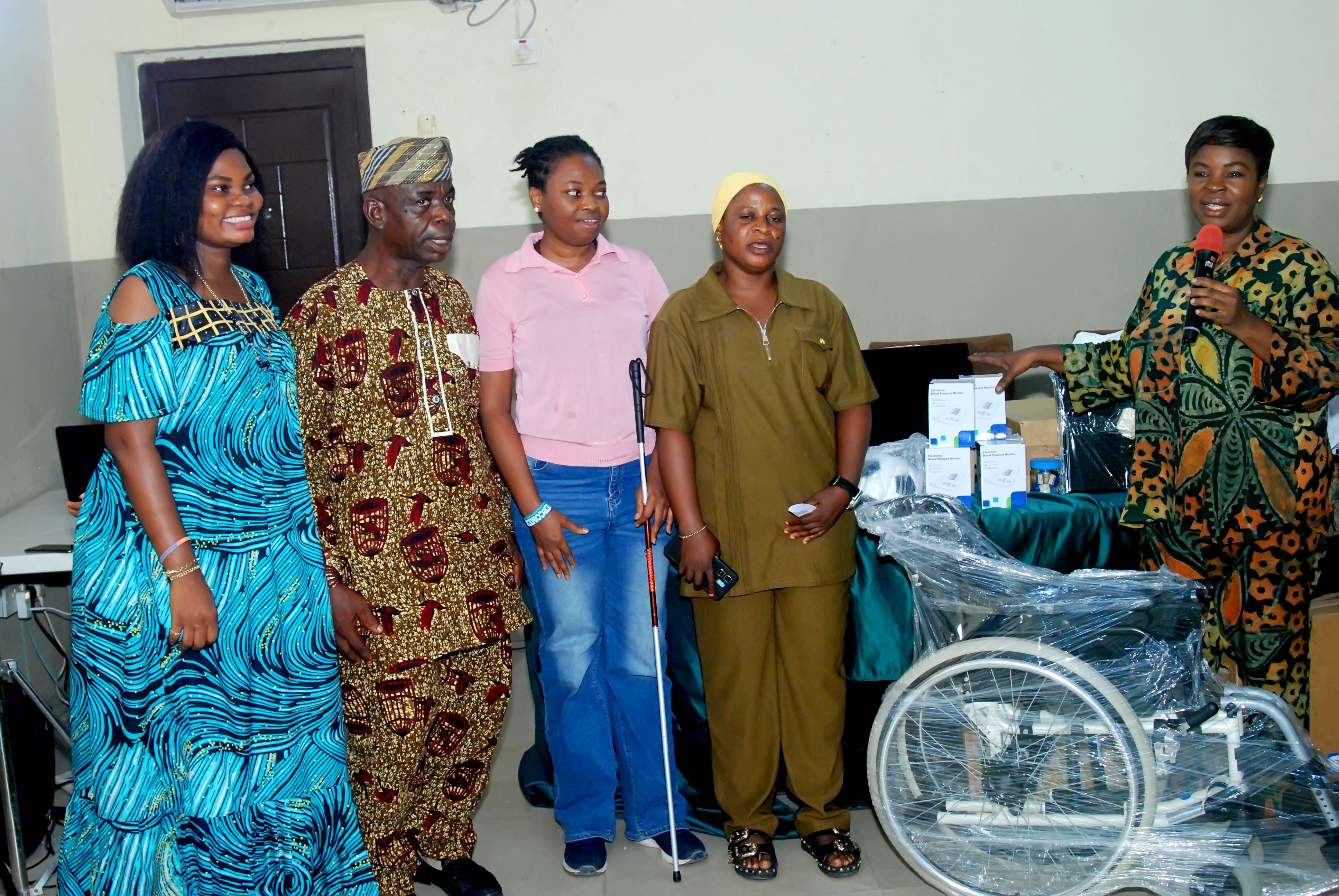 L-R: Blessing Oladunjoye, Executive Director of BO Foundation for Inclusive Media; Mr Emmanuel Dada, Member, Board of Trustees, Divine International Centre for the Blind; Faith Ekienabor, Vice Chair, Nigeria Association of the Blind, Lagos; Mrs Hamzat, mother of a child with physical disability; and Dr Oluwafunmilayo Adekola, Director, Monitoring Evaluation and Orientation, Lagos State Office for Disability Affairs (LASODA) at the public presentation of assistive devices to disability groups in Lagos.